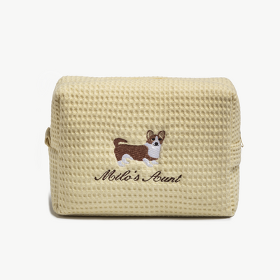 Custom embroidered waffle pouch in white cotton with dog embroidered and Milo's Aunt — personalized cosmetic bag